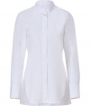 Perfect for layering over slim-cut separates, Jil Sanders stand-up collar blouse is essential for modern-minimalist looks - Stand-up collar, long sleeves, wide buttoned cuffs, hidden button-down front, slit sides, curved hemline - Longer length, tailored fit - Wear with bright skinnies, flats and sleek leather totes