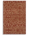 A blend of traditional and contemporary design elements, this unique piece displays an inviting, weathered look in deep red colorways. Plush New Zealand wool gives the rug a soft surface that holds up in the busiest rooms in your home.