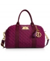 Pack up and go in style with this plush, quilted weekender from Juicy Couture. Perfect for stashing all the sleepover essentials you simply can't do without, and the convenient crossbody strap makes carrying it all a breeze.