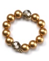 Go bold in gold and bring a touch of fun style to your look with this stretch bracelet from Carolee.