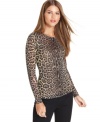 Add fierce flair to your fall look with this BCBGMAXAZRIA leopard-print top -- wear it dressy or casual!