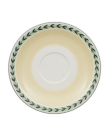 In sunny yellow porcelain with pretty vine trim, this French Garden saucer is perfectly at home on casual country tables. In sunny yellow porcelain with pretty vine trim, this French Garden saucer is perfectly at home on casual country tables.