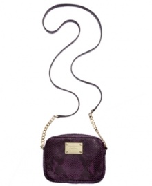 Before you breeze off to Bali, bring along this python print design by MICHAEL Michael Kors. Rich leather is accented with signature golden hardware, while the convenient crossbody strap makes it perfect companion for your jet set journey. Before you breeze off to Bali, bring along this python print design by MICHAEL Michael Kors. Rich leather is accented with signature golden hardware, while the convenient crossbody strap makes it perfect companion for your jet set journey.