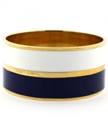 Sailor's delight. A nautical theme takes shape in the form of navy and white enamel stripes on Vince Camuto's trendy bangle bracelet. Crafted in gold tone mixed metal. Approximate diameter: 2-1/2 inches.