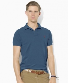 An iconic short-sleeved polo shirt is cut in a relaxed, comfortable fit from breathable cotton mesh for classic style.