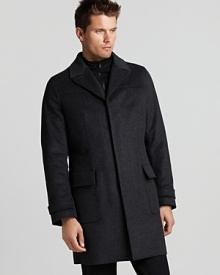 This structured Elie Tahari wool jacket features a classic notch lapel, belted cuffs and a back welt, while a lightweight zip-out liner lends supreme versatility. This structured Elie Tahari wool jacket features a classic notch lapel, belted cuffs and a back welt, while a lightweight zip-out liner lends supreme versatility.