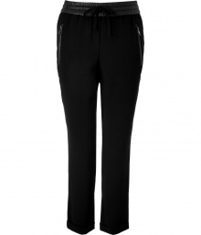 With a sporty cut and luxe lambskin waistband, Steffen Schrauts black drawstring pants are the perfectly versatile choice for dressing up and down - Leather elasticized drawstring waistband, zippered side slit pockets, cuffed ankles - Loosely tailored fit, ankle length - Wear with a feminine satin top and heels With a sporty cut and luxe lambskin waistband, Steffen Schrauts black drawstring pants are the perfectly versatile choice for dressing up and down - Leather elasticized drawstring waistband, zippered side slit pockets, cuffed ankles - Loosely tailored fit, ankle length - Wear with a feminine satin top and heels