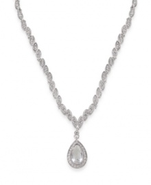 Look simply luminous in this glittering glass stone pendant by Carolee. Crafted in silver tone mixed metal. Approximate length: 16 inches + 2-inch extender. Approximate drop: 1-1/2 inches.