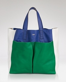 Tap this season's color-blocked trend with Anya Hindmarch's leather tote. In a practical shape and crave-worthy color way, this bag is a luxe match for a casual denim and tee duo. Tap this season's color-blocked trend with Anya Hindmarch's leather tote. In a practical shape and crave-worthy color way, this bag is a luxe match for a casual denim and tee duo.