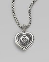 From the Cable Heart Collection. This exquisite cutout heart of fine sterling silver features the iconic logo at its center. Sterling silver Width, about 1 Imported 