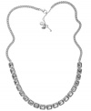 Simply stunning. A bezel-set clear faceted crystal shines brightly on this beautiful necklace from Fossil. Crafted in vintage silver tone mixed metal, it includes a secure lobster claw closure. Approximate length: 24 inches + 2-inch extender.