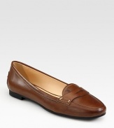 Surprisingly smooth Italian leather with intricate stitching and a T stamp at the front. Leather upperLeather liningRubber solePadded insoleMade in Italy