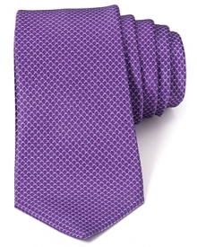 You can never have enough luxury, and this plush Italian silk tie from Valentino adds a decadent touch to your allover refined wardrobe. You can never have enough luxury, and this plush Italian silk tie from Valentino adds a decadent touch to your allover refined wardrobe.