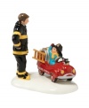 An aspiring fire fighter salutes his hero and tries on his hat in this charming collectible honoring the Snow Village Fire and Rescue squad. From Department 56.