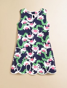 Contrasting scallops sweep across the hem, with allover girly floral print and patch pockets for a glamorous appeal.JewelneckSleevelessBack zipperFront patch pocketsScalloped hem with contrast trim detailFully lined65% polyester/35% cottonMachine washImported Contrasting scallops sweep across the hem, with allover girly floral print and patch pockets for a glamorous appeal.JewelneckSleevelessBack zipperFront patch pocketsScalloped hem with contrast trim detailFully lined65% polyester/35% cottonMachine washImported