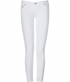 Elevate your cool warm weather staples with these ultra-skinny white jeans from True Religion - Classic five-pocket style, button fly, belt loops - Extra form-fitting, mid-rise - Style with bright tops and fun leather flats