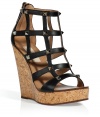 Inject high style to your warm weather look with these ultra-luxe cage sandals from Valentino - Leather cage front upper with stud embellishment, super high wedge cork heel, back zip closure - Style with a pleated maxi dress and a studded shoulder bag