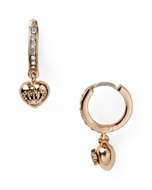 Make a sparkly show of affection. These heart-shaped hoop earrings from Juicy Couture are a delicate way to show your label love.