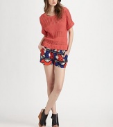 Lightweight cotton crochet with strategically-placed opaque stripes for only a subtle hint of skin-baring chic.ScoopneckShort sleevesRibbed trimPullover styleAbout 23 from shoulder to hemCottonDry cleanImportedModel shown is 5'10 (177cm) wearing US size Small.