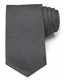 Crafted in pure Italian silk, this design from Armani Collezioni is a standout in your refined collection of ties. Pair with a lighter shade button-down, like pink or pale blue, for a striking combination. Crafted in pure Italian silk, this design from Armani Collezioni is a standout in your refined collection of ties. Pair with a lighter shade button-down, like pink or pale blue, for a striking combination.