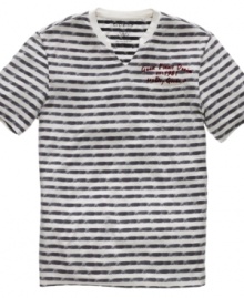 A v neck and stripes on this Guess t shirt add a nautical touch that really makes a style statement.