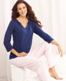 Lounge around in the complete cuteness of Nautica's Pink Dot pajamas. The v-neck long-sleeve top is roomy and comfortable, while the pants feature an elastic waistband with pink ribbon tie and are covered with small navy blue anchor details. Lounge around in the complete cuteness of Nautica's Pink Dot pajamas. The v-neck long-sleeve top is roomy and comfortable, while the pants feature an elastic waistband with pink ribbon tie and are covered with small navy blue anchor details.
