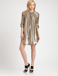 Shimmery, prettily gathered silk lame, rendered with shirt-tailoring details.Gathered jewel necklineConcealed button frontLong sleeves with roll-tab cuffsGathers at back yokeAbout 15 from natural waist69% silk/31% metallicDry cleanMade in USA of imported fabricModel shown is 5'7 (170cm) wearing US size 4. Shimmery, prettily gathered silk lame, rendered with shirt-tailoring details.Gathered jewel necklineConcealed button frontLong sleeves with roll-tab cuffsGathers at back yokeAbout 15 from natural waist69% silk/31% metallicDry cleanMade in USA of imported fabricModel shown is 5'7 (170cm) wearing US size 4.
