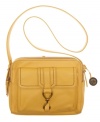 Luxe leather graces this sophisticated design from The Sak. Accented with antique brass-tone hardware and a signature charm, this refined style exudes effortless chic.