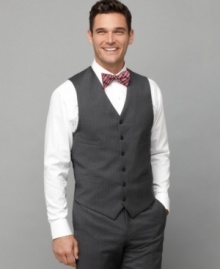 A striped, slim-fit vest from Tommy Hilfiger ups the ante on standard suiting practices. A striped, slim-fit vest from Tommy Hilfiger ups the ante on standard suiting practices.