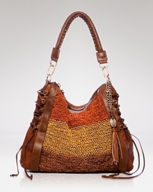 Join the color block bag party with this textured bag from Olivia Harris. Bold stripes are perfectly on-trend, while the slouchy shape is effortless. Join the color block bag party with this textured bag from Olivia Harris. Bold stripes are perfectly on-trend, while the slouchy shape is effortless.