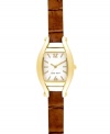 A timely take on a vintage silhouette, by Nine West. Crafted of textured brown leather strap and cushion-shaped gold tone mixed metal case. Silver tone dial with swirling design features gold tone applied stick indices, numerals at twelve and six o'clock, gold tone hour and minute hands, sweeping second hand and logo at six o'clock. Quartz movement. Limited lifetime warranty.