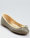 In a tribal-influenced, woven design, these GUESS ballet flats offer summer style with low-key appeal.