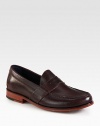 Classic penny loafer is handsewn and crafted in genuine leather with concealed Nike Air Technology in the heel for ultimate comfort and support.Leather upperLeather liningPadded insoleLeather/rubber soleImported