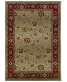 Pristine patterns swirl gracefully against a neutral ground, surrounded by a vivid red border that holds various vines and blossoms. Pristine patterns swirl gracefully against a neutral ground, surrounded by a vivid red border that holds various vines and blossoms.