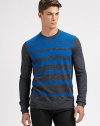 An artful approach to a simply stylish crewneck sweater, striped and woven in a fine blend of wool and linen.CrewneckRibbed knit collar, cuffs and hem38% wool/35% acrylic/15% linen/12% alpacaDry cleanImported