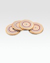 A hypnotic design combines 24k gold, platinum and rose gold on porcelain to create the ideal spot for your favorite drink. Set of 4 Arrives in a signature gift box Porcelain with rubber bottom 24k gold Platinum Each, 4 diam. Wipe clean Made in USA 