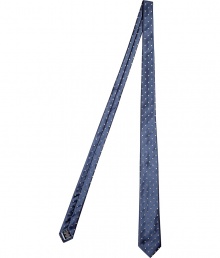 Stylish tie in fine, pure blue silk - Elegant silver polka dot motif - Soft, satin-y material has a subtle sheen - Slimmer cut is modern and polished - Ideal for work and evenings out - Pair with a crisp, white button down and a dark suit - Also makes a superb gift