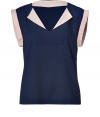 Elegant top in fine, pure navy blue silk - Ultra-soft, lightweight crepe fabric drapes beautifully - Chic, eye-catching nude trim - Slim, straight cut, hem hangs slightly longer in the back - V-neck with small collar and short, wide sleeves - Polished and versatile, seamlessly transitions from work to weekend - Pair with suit trousers, or a pencil or pleated skirt