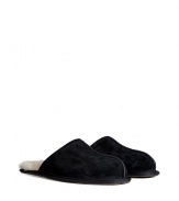 Lounge in comfort and style in these ultra-luxe shearling lined slippers from UGG Australia - Suede upper, shearling lining, slip-on style - Pair with flannel pajamas and a cozy robe