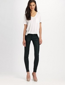 Ultra-slim denim in a coated finish for leather-like chic.THE FITSlim fitRise, about 7Inseam, about 28THE DETAILSZip flyFive-pocket style98% cotton/2% elastaneDry cleanMade in USA of imported fabric Ultra-slim denim in a coated finish for leather-like chic.THE FITSlim fitRise, about 7Inseam, about 28THE DETAILSZip flyFive-pocket style98% cotton/2% elastaneDry cleanMade in USA of imported fabric