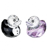 In fine feather, Sir and Lady Duck figurines don a penguin suit and violet gown in fine Swarovksi crystal. Coordinating purple beak liner and a stunning beaded necklace make Lady a particularly happy duck.