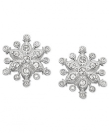 With a winter-inspired motif, Swarovski's pair of pierced earrings is ideal for the cold months. It sparkles in clear crystal pavé and delicately crafted, rhodium-plated metal. Fancy pear-shaped crystals add a touch of classic elegance. Approximate diameter: 3/5 inch.