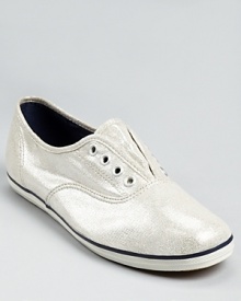 In shimmering coated canvas, these metallic Keds add a glamourous touch to off-duty days. In shimmering coated canvas, these metallic Keds add a glamourous touch to off-duty days.
