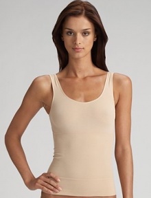 Sleek and seamless shapewear tank in an elasticized knit that instantly smooths and slims your torso. Control fabric helps smooth and slim Pull-on style Nylon/elastene/cotton Hand wash Imported