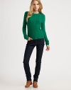 The essential crewneck, crafted from extra-fine merino wool in a chunky cable knit.CrewneckLong sleevesRibbed trimCenter back zipperPullover styleAbout 23 from shoulder to hemMerino woolDry cleanImportedModel shown is 5'9 (175cm) wearing US size Small.