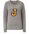 Quietly elegant and effortlessly cool, Jil Sanders pale grey cashmere pullover ups the ante on preppy chic - Slim, straight  cut tapers gently through waist - Decorative yellow and navy varsity letter J and wide rib trim at cuffs, hem and collar - Polished and versatile, ideal for pairing with pencil skirts, skinny denim and cigarette pants