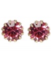 Hot pink! Perenially fashionable and feminine, a pretty pink hue stands out on these round faceted crystal stud earrings from Betsey Johnson. Crafted in antique gold tone mixed metal, they're a stylish solution for mixing and matching with your favorite outfits. Approximate diameter: 1/3 inch.