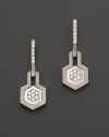 Brilliant diamonds accent India Hicks' sterling silver drop earrings.