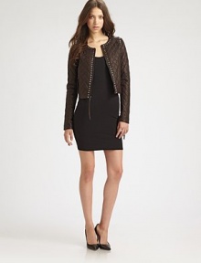 Gleaming pyramid studs and a quilted finish elevate this cropped leather topper to a contemporary statement-maker.RoundneckLong sleevesZipper frontSide zip pocketsAbout 20 from shoulder to hemLambskinDry clean by a leather specialistChinaModel shown is 5'11 (180cm) wearing US size Small.