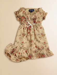 An adorable floral-patterned dress is rendered in light chiffon with a ruffled hem for charm that transcends the seasons.Ruffled CrewneckShort ruffled sleevesButton-frontElasticized waist with ribbonRuffled hemPolyesterMachine washImported Please note: Number of buttons may vary depending on size ordered. An adorable floral-patterned dress is rendered in light chiffon with a ruffled hem for charm that transcends the seasons.Ruffled CrewneckShort ruffled sleevesButton-frontElasticized waist with ribbonRuffled hemPolyesterMachine washImported Please note: Number of buttons may vary depending on size ordered.